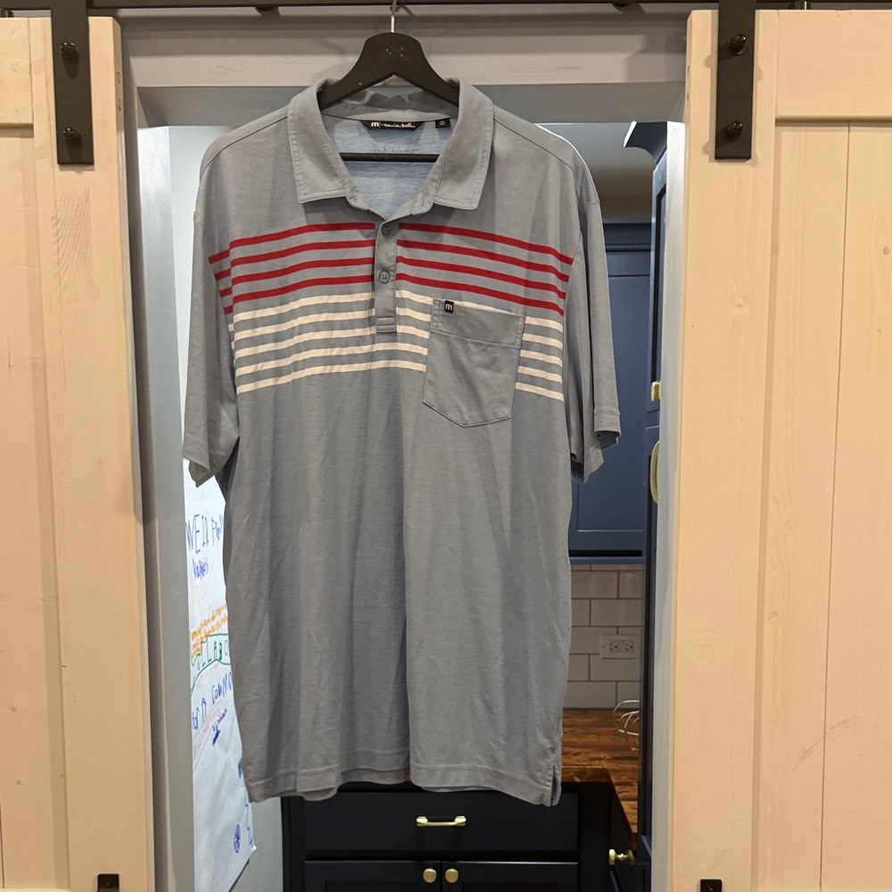 Travis Mathew Light Blue Polo with Red and White Stripes